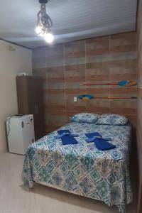 Ένα ή περισσότερα κρεβάτια σε δωμάτιο στο Araçatiba Flat