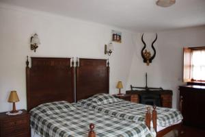 Giường trong phòng chung tại Quinta da Imaculada