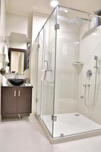 Ванна кімната в Marigold Inn- Homestay