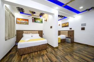 En eller flere senge i et værelse på Jia Calangute Goa + 15 billeder