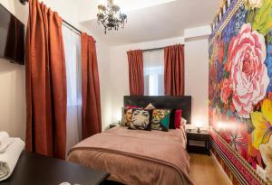 Postel nebo postele na pokoji v ubytování B&B Ventisei Scalini A Trastevere