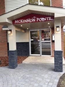 a store front of a magnkin pointrite at McKinnon Pointe #108 in Edmonton