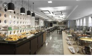 Ресторан / й інші заклади харчування у Flat Luxo Afonso Pena - Savassi/Serra/Mangabeiras