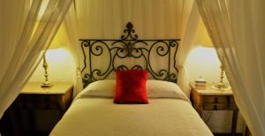 En eller flere senge i et værelse på Areté