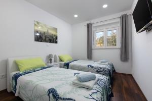 Una cama o camas en una habitación de Villa Little Heaven 35 fotos más