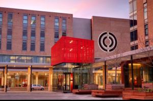 a building with a red object in front of it at Matrix Luxury 2 bedroom Apartments Century City, Cape Town in Cape Town