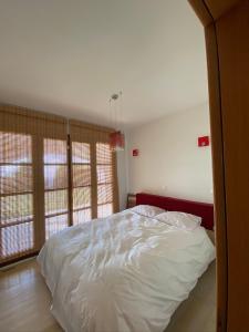 Postel nebo postele na pokoji v ubytování Arachova Vip smart chalet-Villa Eva 1