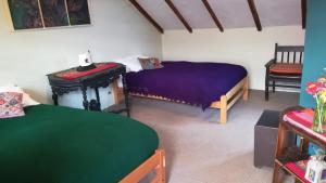 Postel nebo postele na pokoji v ubytování Casa Panqarani