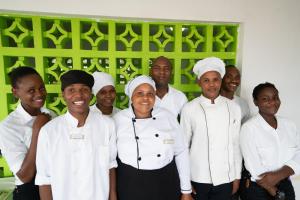 a group of chefs posing for a picture at Stonetown View Hotel in Zanzibar City