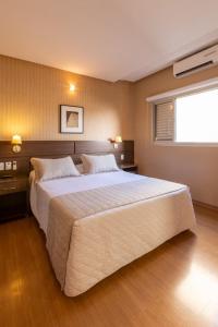 Cama ou camas em um quarto em Hotel Bahamas