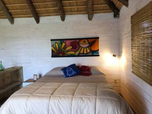 Кровать или кровати в номере Palapas al mar
