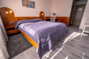 Postel nebo postele na pokoji v ubytování Hotel Klosterhof