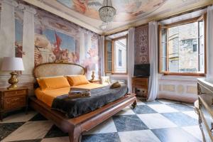 A television and/or entertainment centre at Domus Nannini SPA - Palazzo Nannini