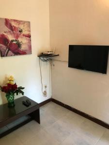 A television and/or entertainment centre at MJM Villa