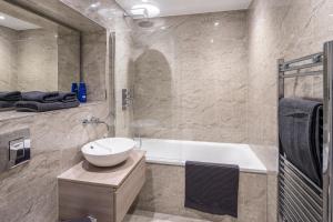 Um banheiro em St Albans City Apartments - Near Luton Airport and Harry Potter World