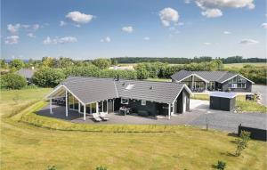an overhead view of a house with a roof at Gorgeous Home In Bogense With Wifi in Bogense