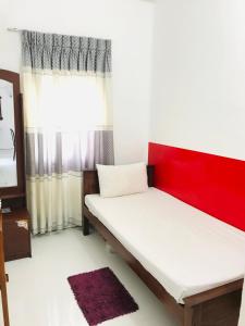 Postel nebo postele na pokoji v ubytování Bon Voyaage Tourist Inn