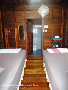 Postel nebo postele na pokoji v ubytování Haad Salad Resort