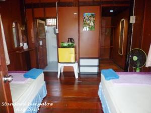 Postel nebo postele na pokoji v ubytování Haad Salad Resort