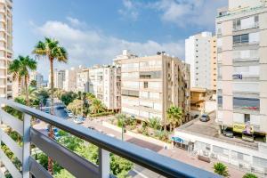 an apartment balcony with a view of a city at MAGNIFIQUE APPARTEMENT A 3' DE LA PLAGE ET KIKAR in Netanya