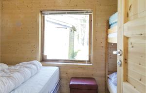 a room with a window in a wooden cabin at Beautiful Home In Dirdal With 1 Bedrooms And Wifi in Dirdal