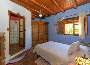 Postel nebo postele na pokoji v ubytování CASA EL CANTÓN