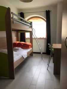 Un pat sau paturi într-o cameră la Villa Romanin