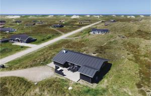 an overhead view of a house on a hill at Pet Friendly Home In Hvide Sande With Wifi in Havrvig
