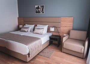 Voodi või voodid majutusasutuse Kaneo beach hotel Novalja toas