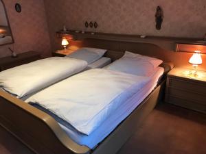 Postel nebo postele na pokoji v ubytování Gemütliches Gästehaus!