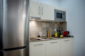 Kuchyňa alebo kuchynka v ubytovaní Apartamentos Turísticos Moret11-1B