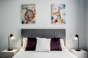Posteľ alebo postele v izbe v ubytovaní Apartamentos Turísticos Moret11-1B