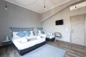 Postel nebo postele na pokoji v ubytování Hotel Miceli - Civico 50