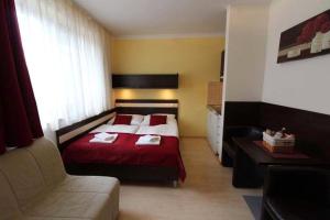 Posteľ alebo postele v izbe v ubytovaní Apartmán Eden