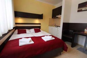 Posteľ alebo postele v izbe v ubytovaní Apartmán Eden