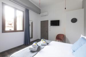 Postel nebo postele na pokoji v ubytování Hotel Miceli - Civico 50