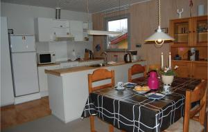 Kuchyň nebo kuchyňský kout v ubytování Holiday Home Hybenvænget Hejls Iv + 5 fotografií