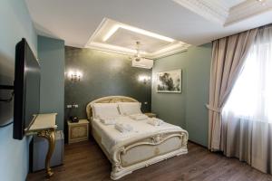 TV a/nebo společenská místnost v ubytování Elite Palace