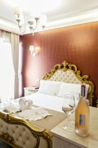 Postel nebo postele na pokoji v ubytování Elite Palace
