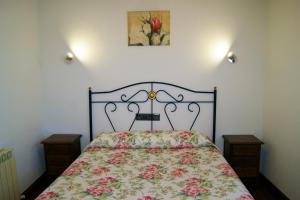 Casa Rural Arboliz tesisinde bir odada yatak veya yataklar