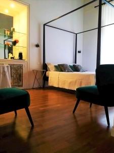 Postel nebo postele na pokoji v ubytování Il Rosone Luxury B&B