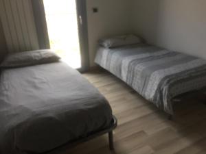 Posteľ alebo postele v izbe v ubytovaní incantevole