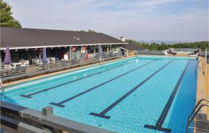 a large swimming pool on top of a building at Golfparken in Danland Løjt