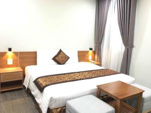 Gulta vai gultas numurā naktsmītnē Nakichi Hotel Phú Quốc