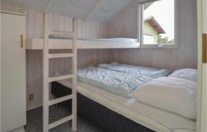 Postel nebo postele na pokoji v ubytování Holiday Home Skippervej X