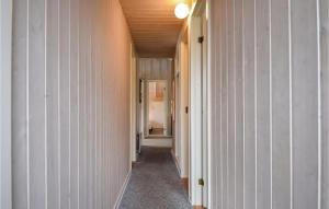 Postel nebo postele na pokoji v ubytování Holiday Home Skippervej X