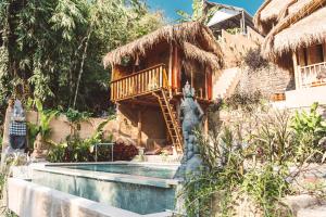 Gallery image of BALI BAMBOO JUNGLE HUTS AND HOSTEL in Tampaksiring