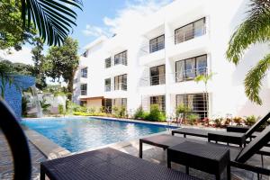 Bazén v ubytování Miranda Beach Resort Baga nebo v jeho okolí