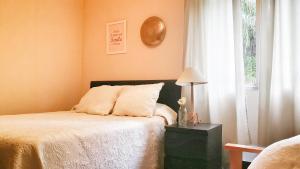 Postel nebo postele na pokoji v ubytování Apartamento Rías Baixas - 1a Línea Playa Raxó