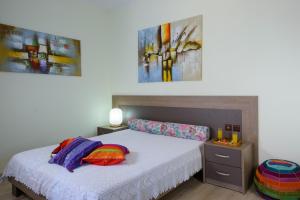 Posteľ alebo postele v izbe v ubytovaní BEACH HOUSE
